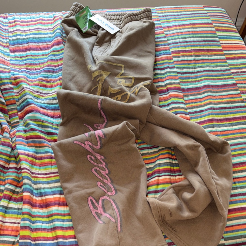1/2 price Triple  Sevens size small, oversized distressed Beachy Sweatpants  nwt